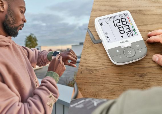 Ein junger Mann im Hoodie steht im Freien und blickt auf seine Smartwatch. Daneben eine Abbildung eines Beurer Blutdruckmessgeräts auf einem Tisch.